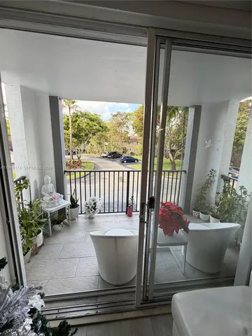 a living room with furniture and a view of couch