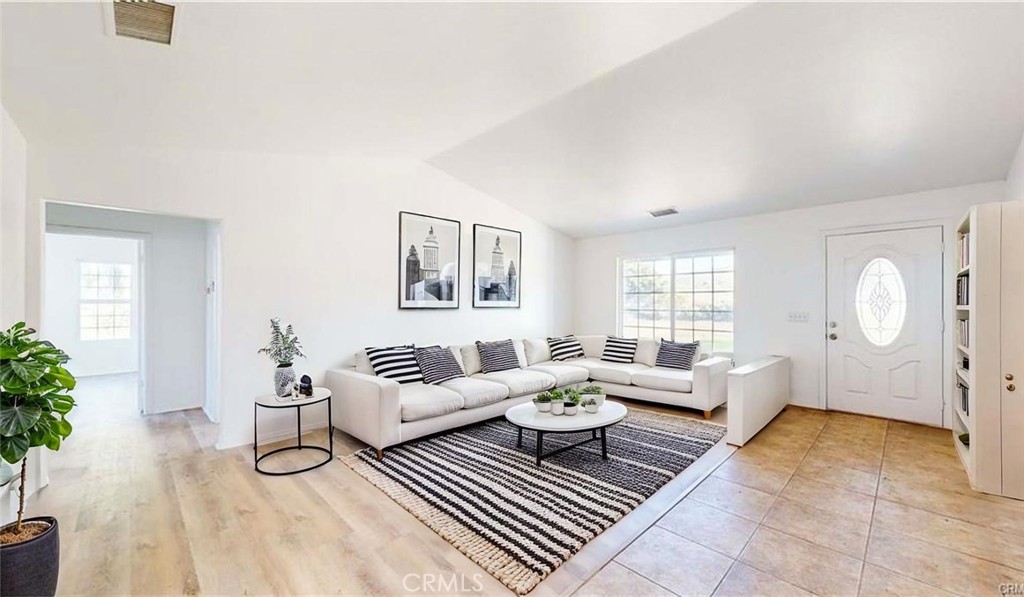 16201 Alta Cresta Avenue Riverside, CA 92508 - Photo 12 of 51 a living room with furniture and a window