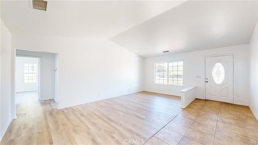 16201 Alta Cresta Avenue Riverside, CA 92508 - Photo 13 of 51 an empty room with windows