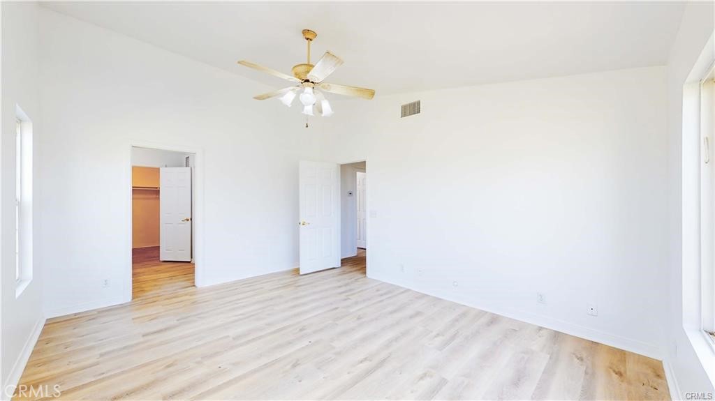 16201 Alta Cresta Avenue Riverside, CA 92508 - Photo 19 of 51 a view of empty room with wooden floor