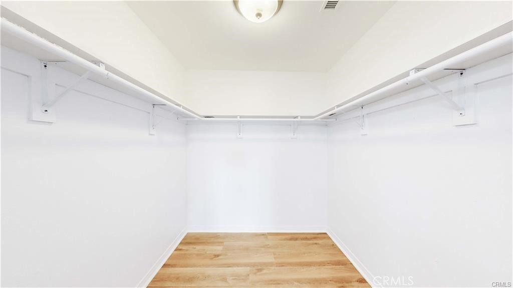 16201 Alta Cresta Avenue Riverside, CA 92508 - Photo 24 of 51 a view of a room with racks on the wall