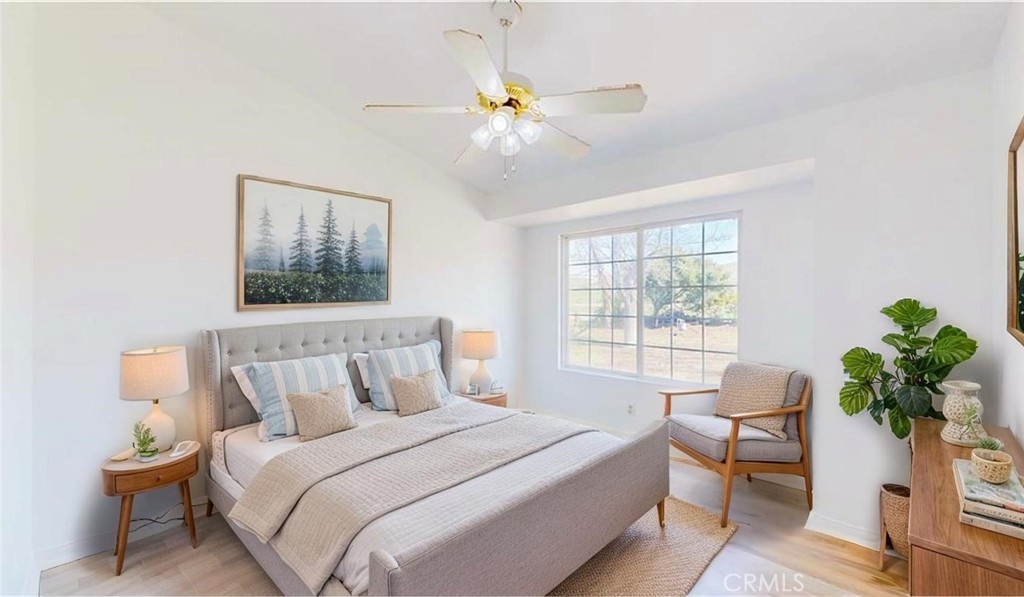 16201 Alta Cresta Avenue Riverside, CA 92508 - Photo 25 of 51 a bedroom with a bed and a window