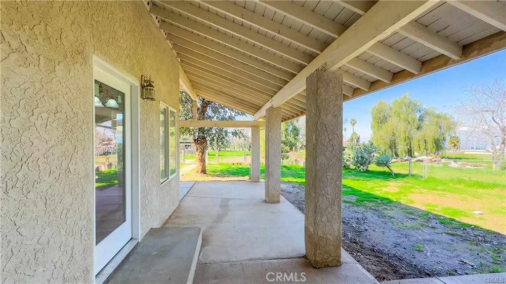 16201 Alta Cresta Avenue Riverside, CA 92508 - Photo 37 of 51 a view of a porch and garden