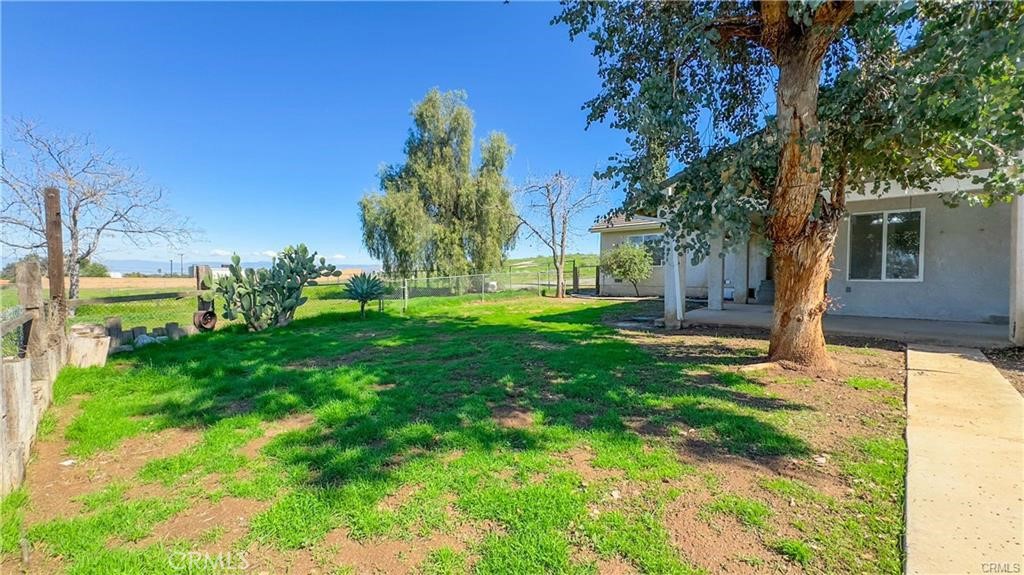 16201 Alta Cresta Avenue Riverside, CA 92508 - Photo 48 of 51 a view of a house with a yard