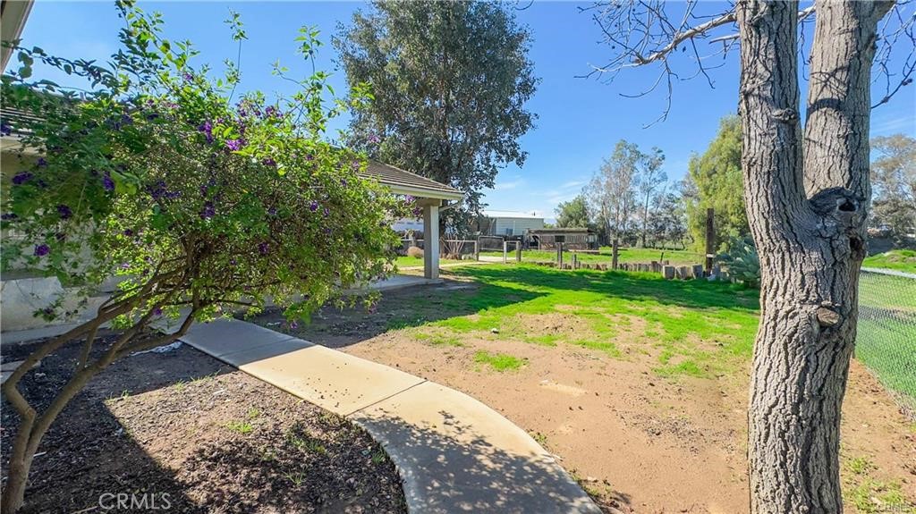 16201 Alta Cresta Avenue Riverside, CA 92508 - Photo 50 of 51 a view of a yard with plants and trees