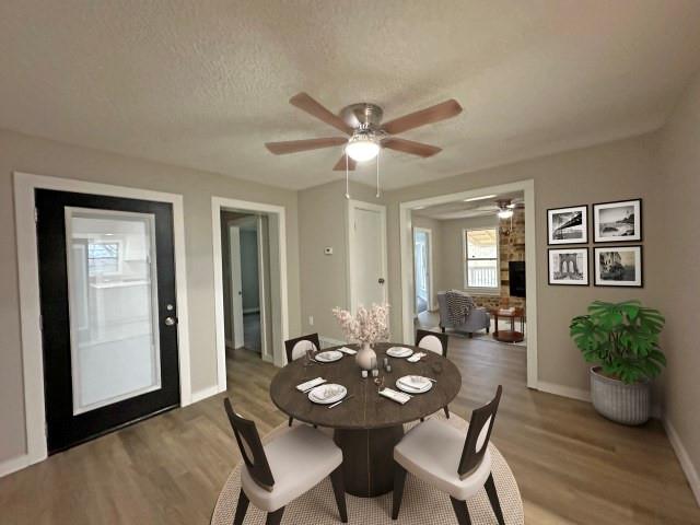 7121 McGregor Park Road Temple, TX 76502 - Photo 12 of 21 a view of a dining room with furniture and wooden floor