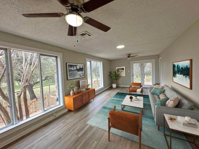 7121 McGregor Park Road Temple, TX 76502 - Photo 8 of 21 a living room with furniture and a large window