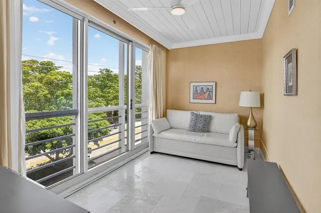 a room with a bench and cabinets