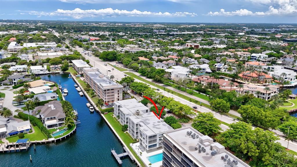 850 Northeast Spanish River Boulevard, Unit 33 Boca Raton, FL 33431 - Photo 30 of 37 an aerial view of residential houses with outdoor space