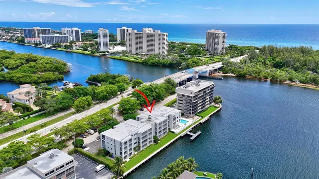 an aerial view of house with yard swimming pool and outdoor seating