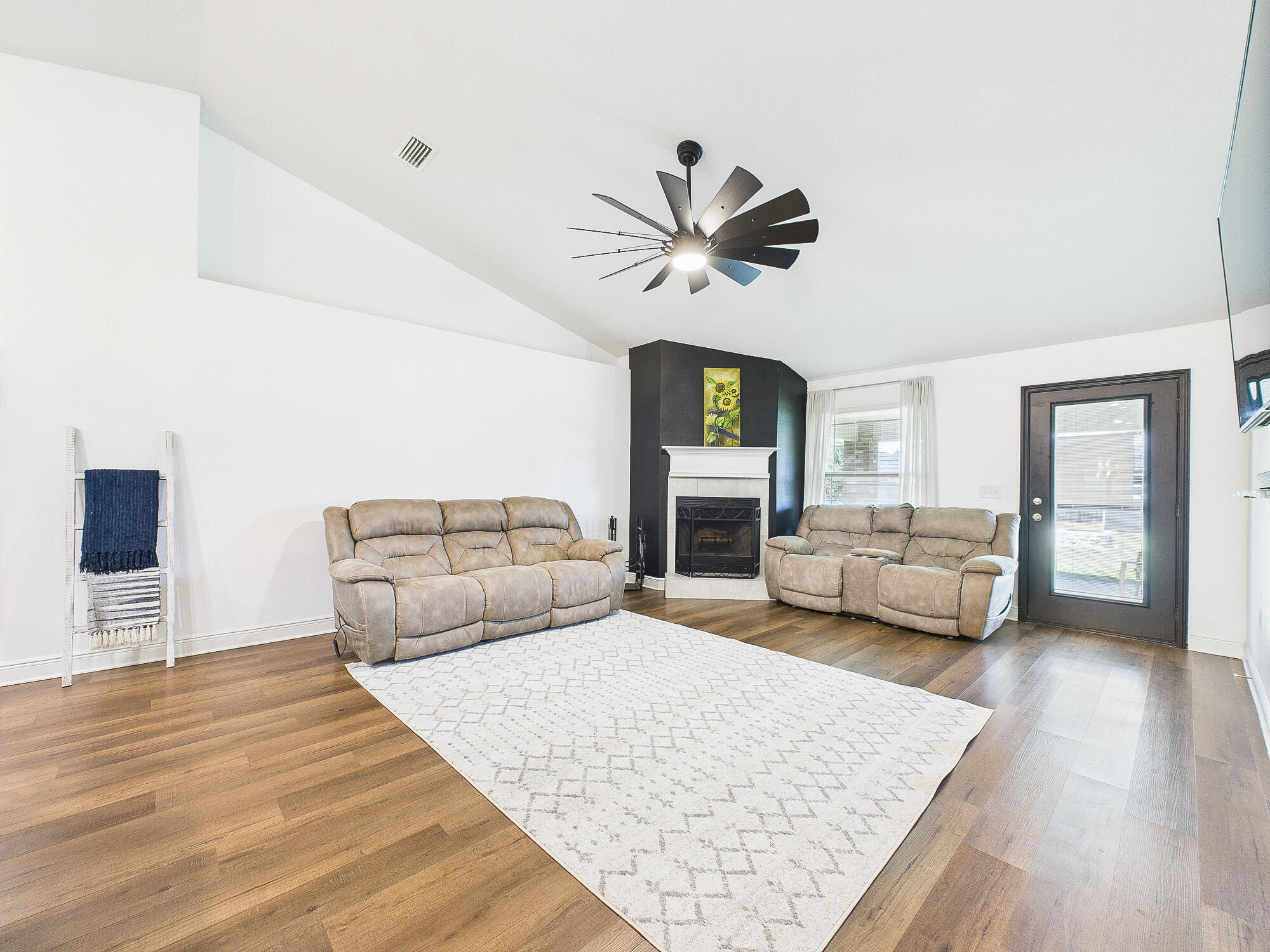 5740 Marigold Loop Crestview, FL 32539 - Photo 15 of 47 a living room with furniture and a wooden floor