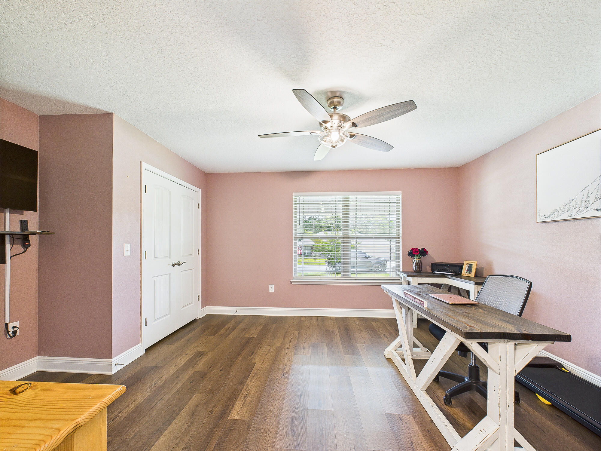 5740 Marigold Loop Crestview, FL 32539 - Photo 34 of 47 a workspace with wooden floor and a window