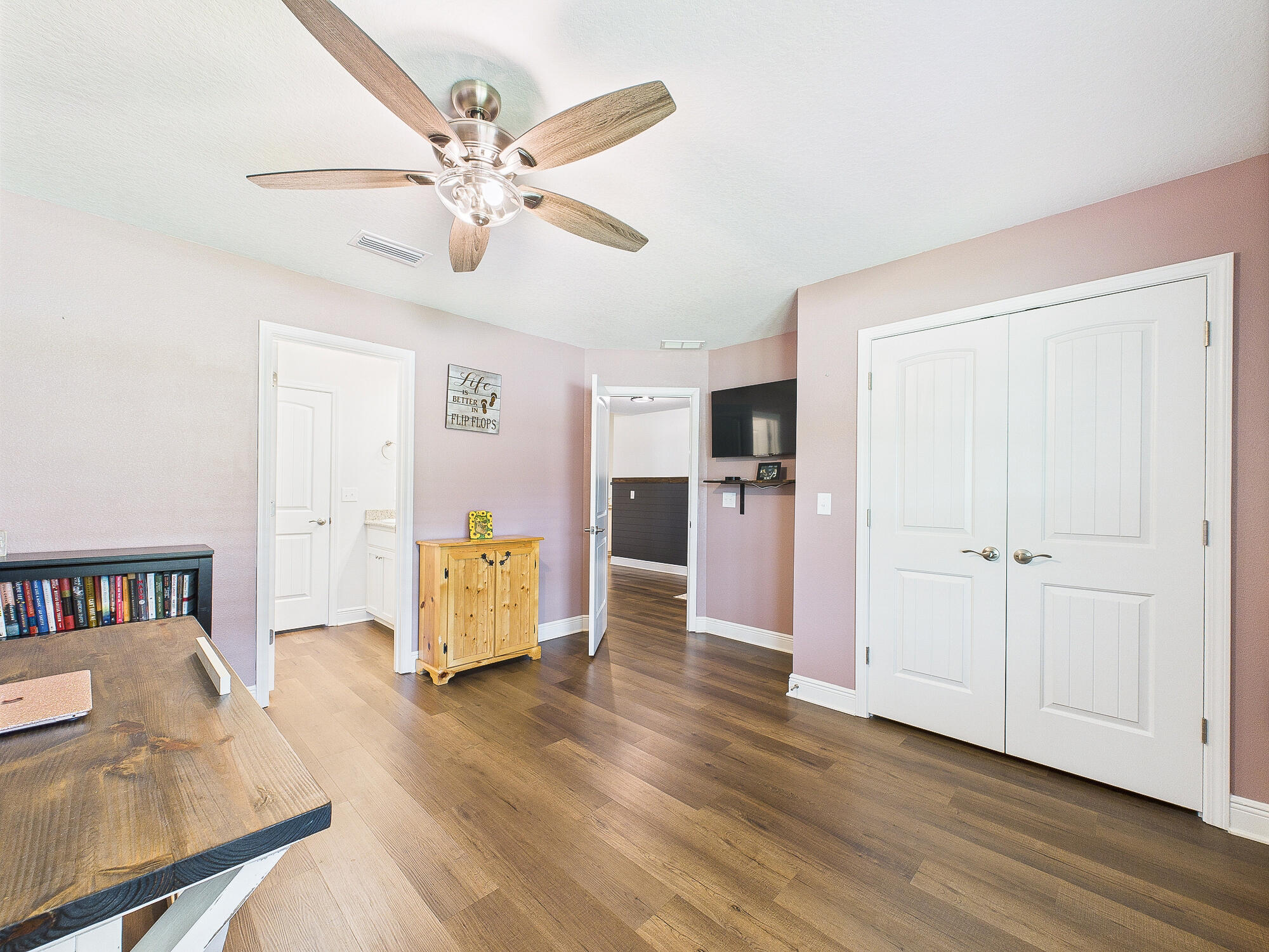 5740 Marigold Loop Crestview, FL 32539 - Photo 35 of 47 a living room with furniture and a wooden floor