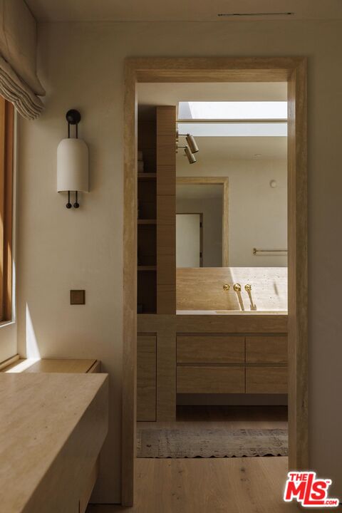 12128 Viewcrest Road Studio City, CA 91604 - Photo 15 of 24 a bathroom with a sink and a mirror
