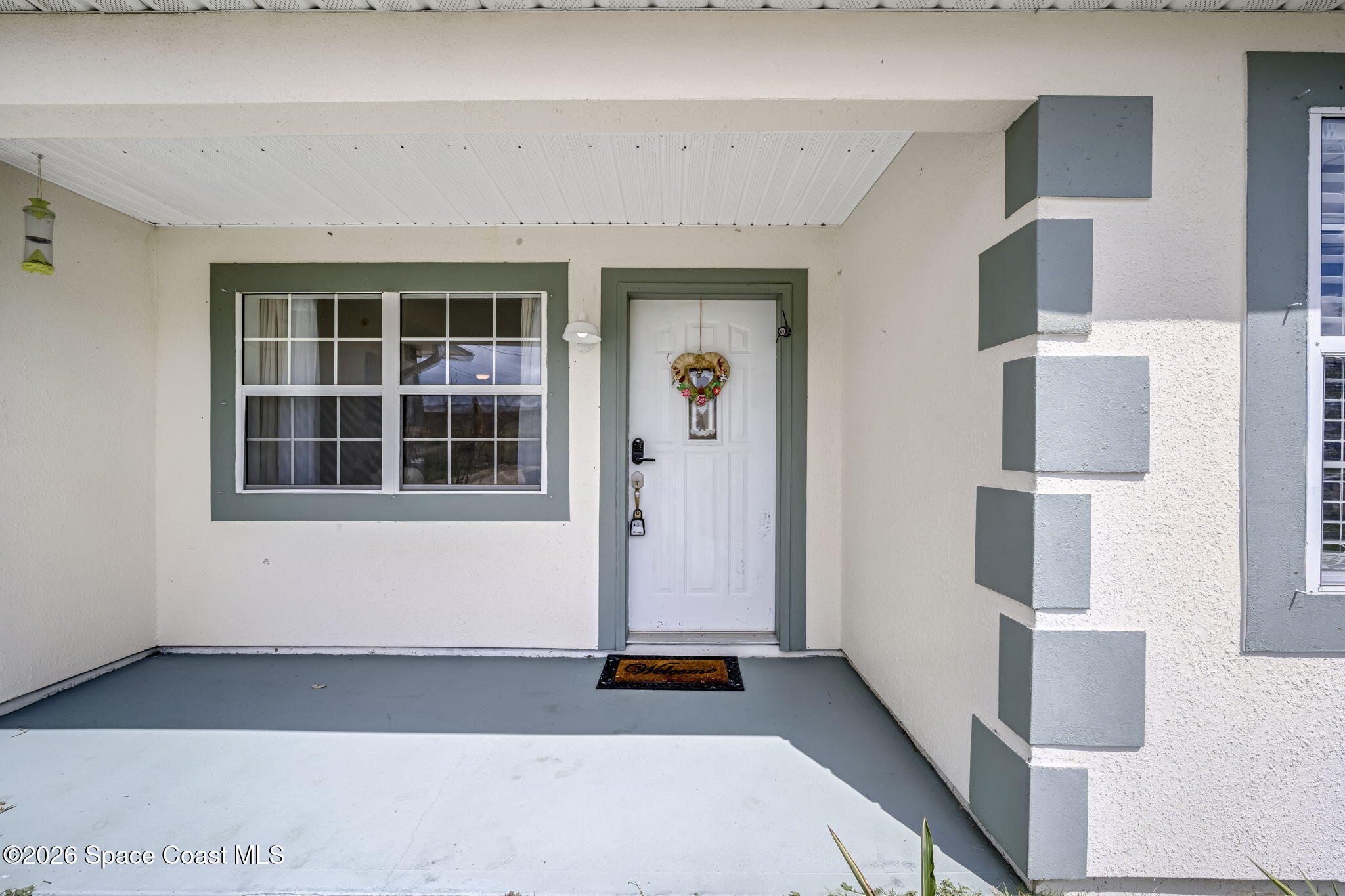 3404 Kilbee Street Mims, FL 32754 - Photo 3 of 30 a front view of a house with stairway