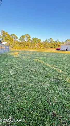 a view of an ocean and a mountain