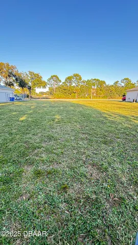 a view of an ocean and a city