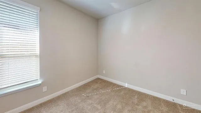 an empty room with a window