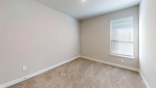 an empty room with a window