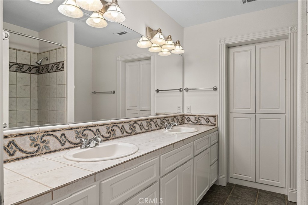 897 Filbert Avenue Chico, CA 95926 - Photo 41 of 66 a bathroom with a sink and a mirror