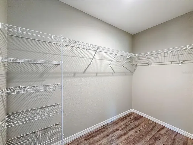 a view of a room with racks on the wall