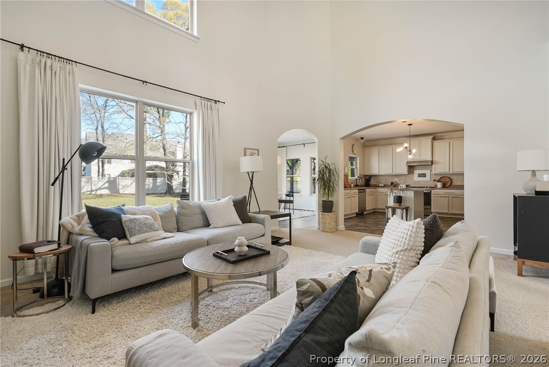 1219 Coachman Way Sanford, NC 27332 - Photo 12 of 46 a living room with furniture and a large window