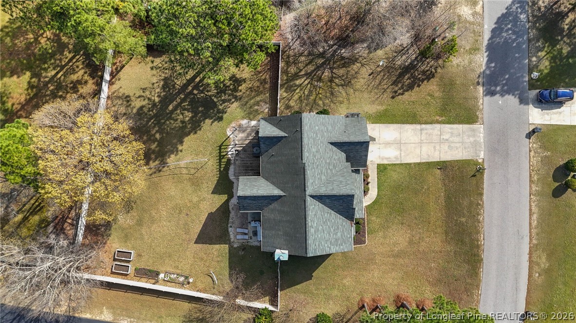 1219 Coachman Way Sanford, NC 27332 - Photo 2 of 46 an aerial view of residential houses with outdoor space