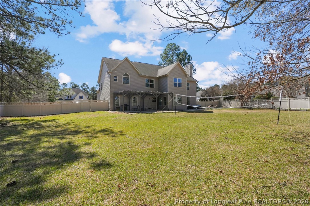 1219 Coachman Way Sanford, NC 27332 - Photo 37 of 46 a view of a house with a yard