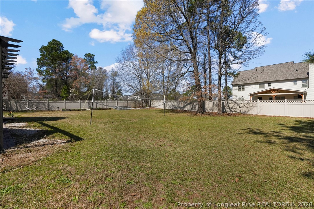 1219 Coachman Way Sanford, NC 27332 - Photo 40 of 46 a view of a yard with a tree