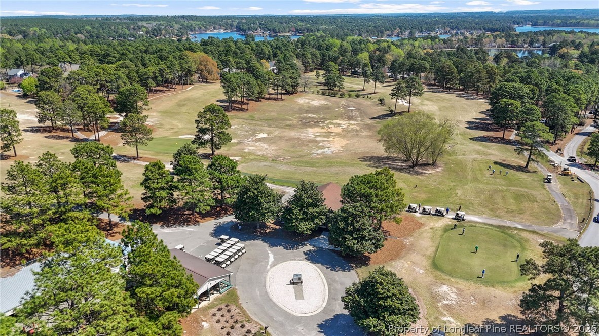 1219 Coachman Way Sanford, NC 27332 - Photo 42 of 46 an aerial view of residential houses with outdoor space
