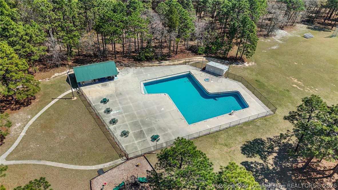 1219 Coachman Way Sanford, NC 27332 - Photo 44 of 46 aerial view of a house with swimming pool