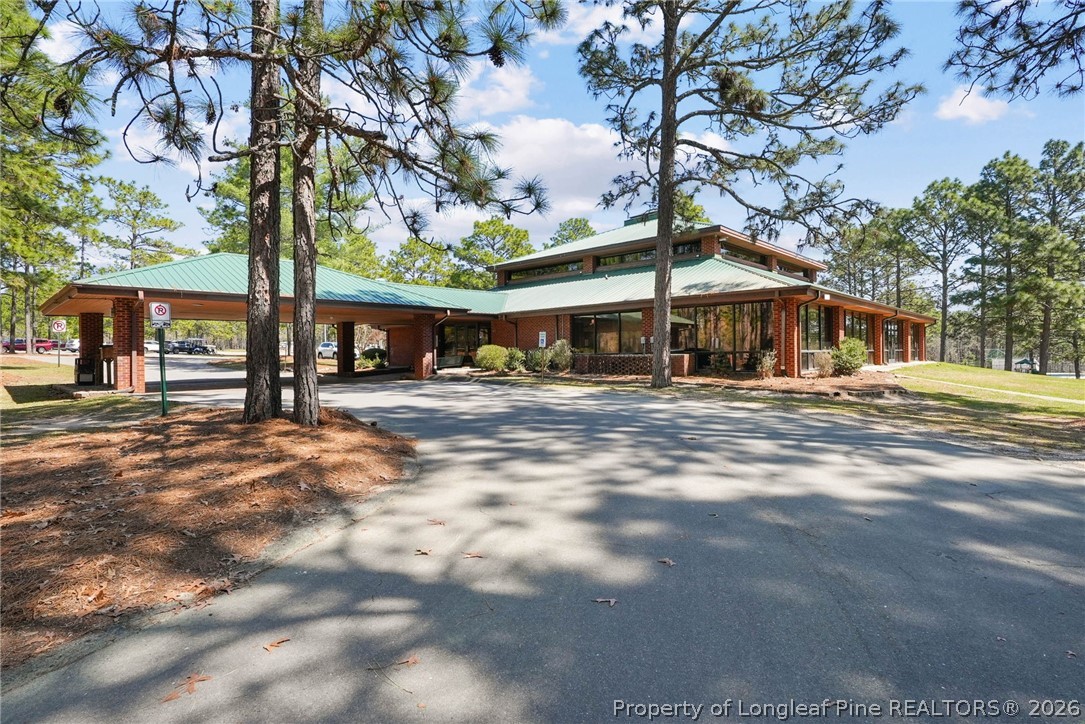 1219 Coachman Way Sanford, NC 27332 - Photo 46 of 46 a front view of a building with street view