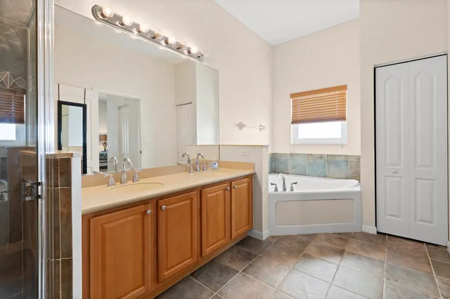 a view of storage and utility room with a window