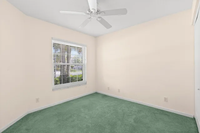 a view of a livingroom with a ceiling fan
