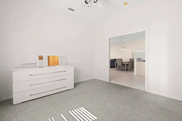 a view of a lake with a building in the background