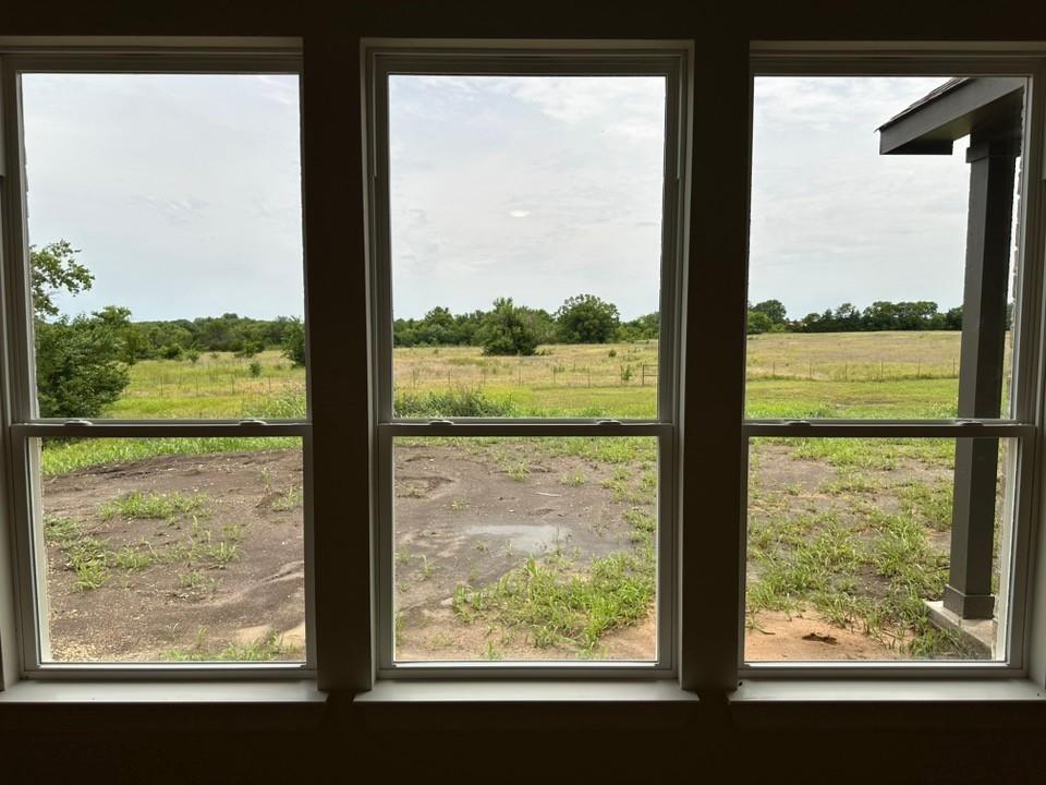 205 Cobb Road Leonard, TX 75452 - Photo 20 of 28 Triple window installation framing an expansive natural landscape