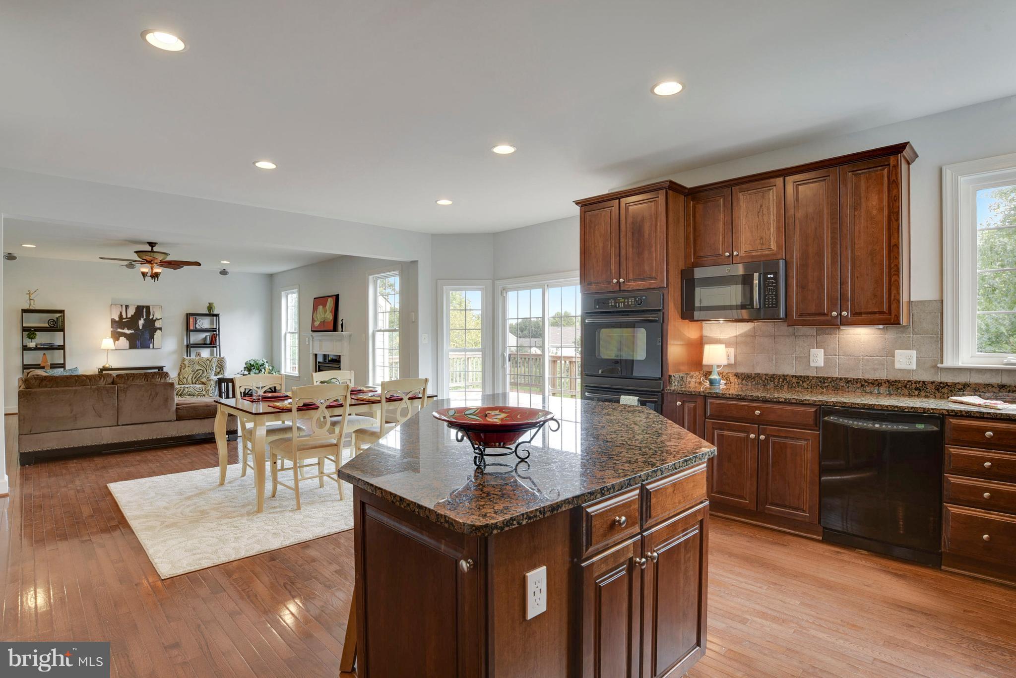 14554 Old Mill Road Centreville, VA 20121 - Photo 2 of 27 Sun-filled kitchen, eating area, and family room