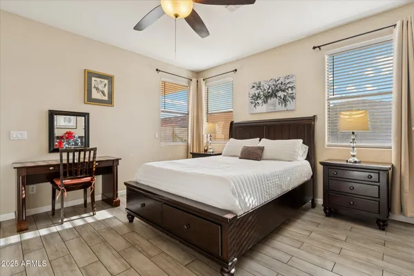 a bed room with a bed and a table