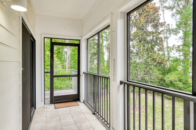 a view of a room with a large window