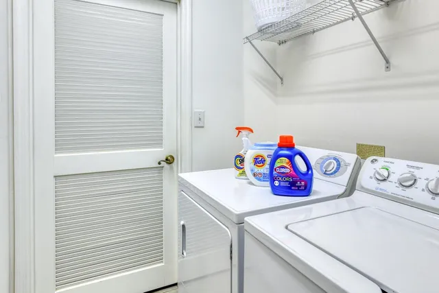 a utility room with washer and dryer