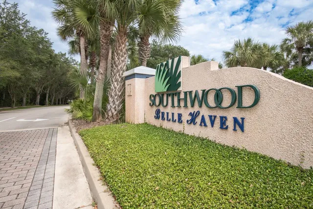 a sign that is on the side of the road