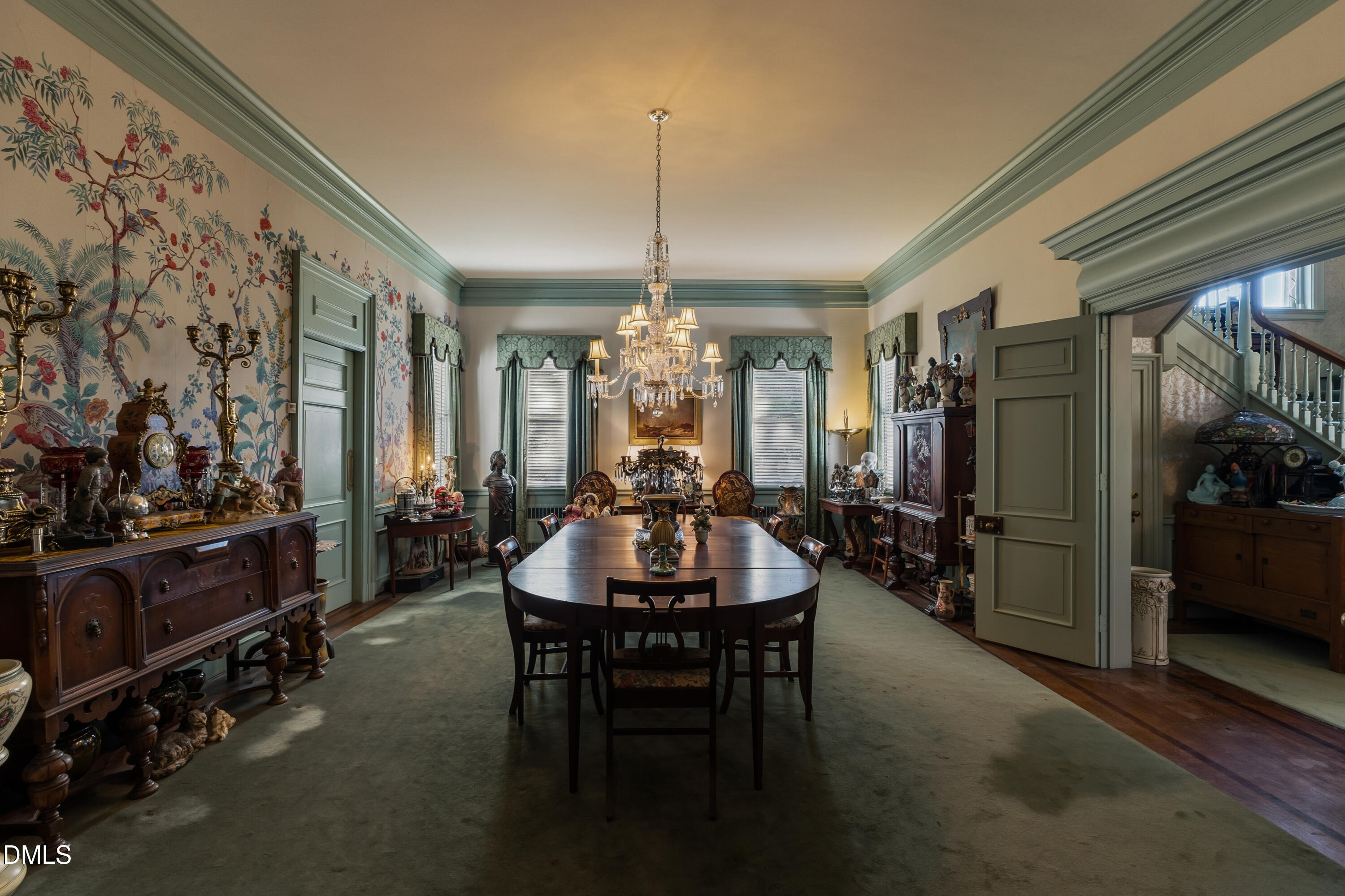900 Nash Street North Wilson, NC 27893 - Photo 15 of 99 a view of a dining room with furniture and chandelier