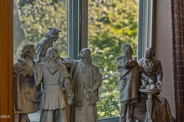 a view of a table and chairs in the patio