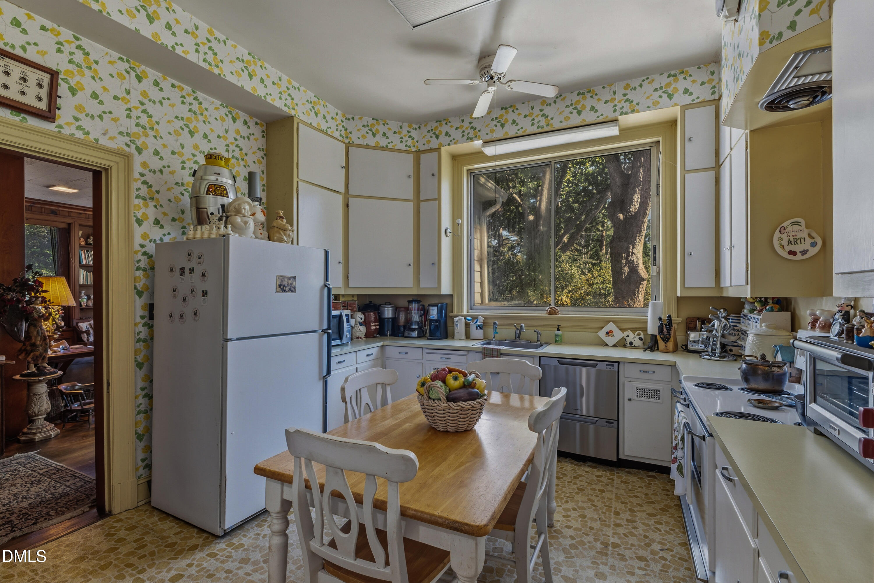 900 Nash Street North Wilson, NC 27893 - Photo 38 of 99 a kitchen with a sink appliances and a counter top space