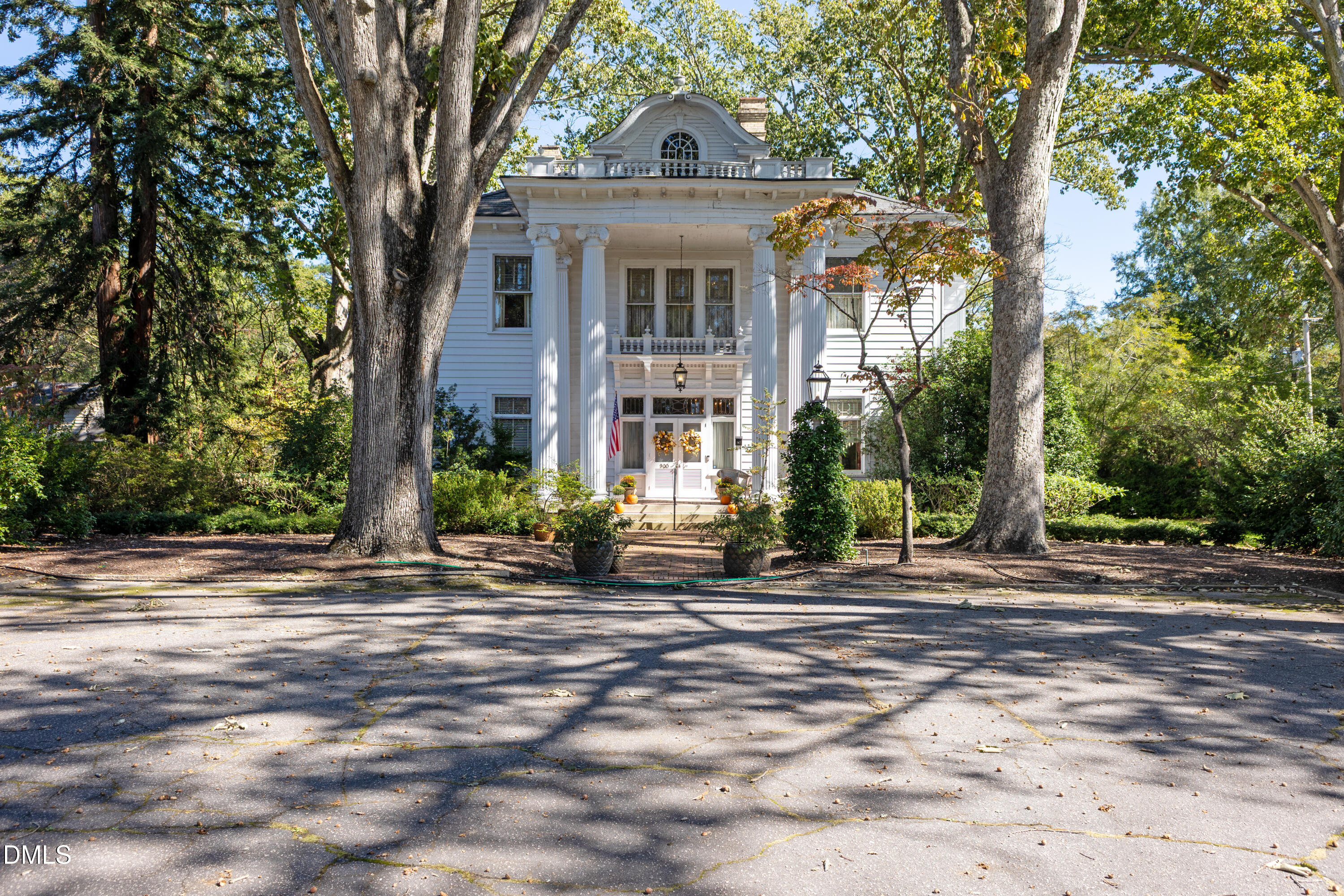 900 Nash Street North Wilson, NC 27893 - Photo 3 of 99 a front view of a house with a garden