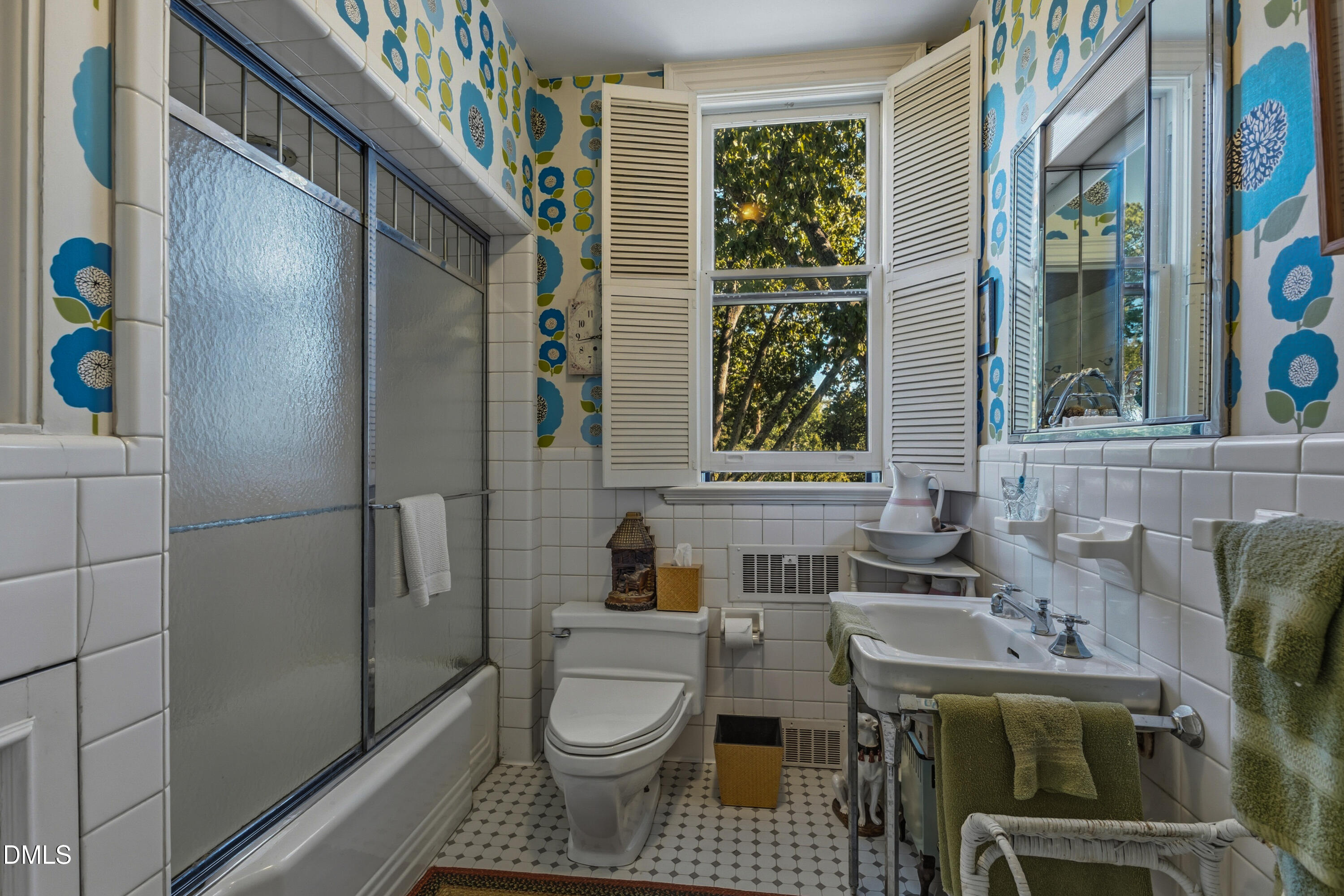 900 Nash Street North Wilson, NC 27893 - Photo 49 of 99 a bathroom with a sink toilet and shower