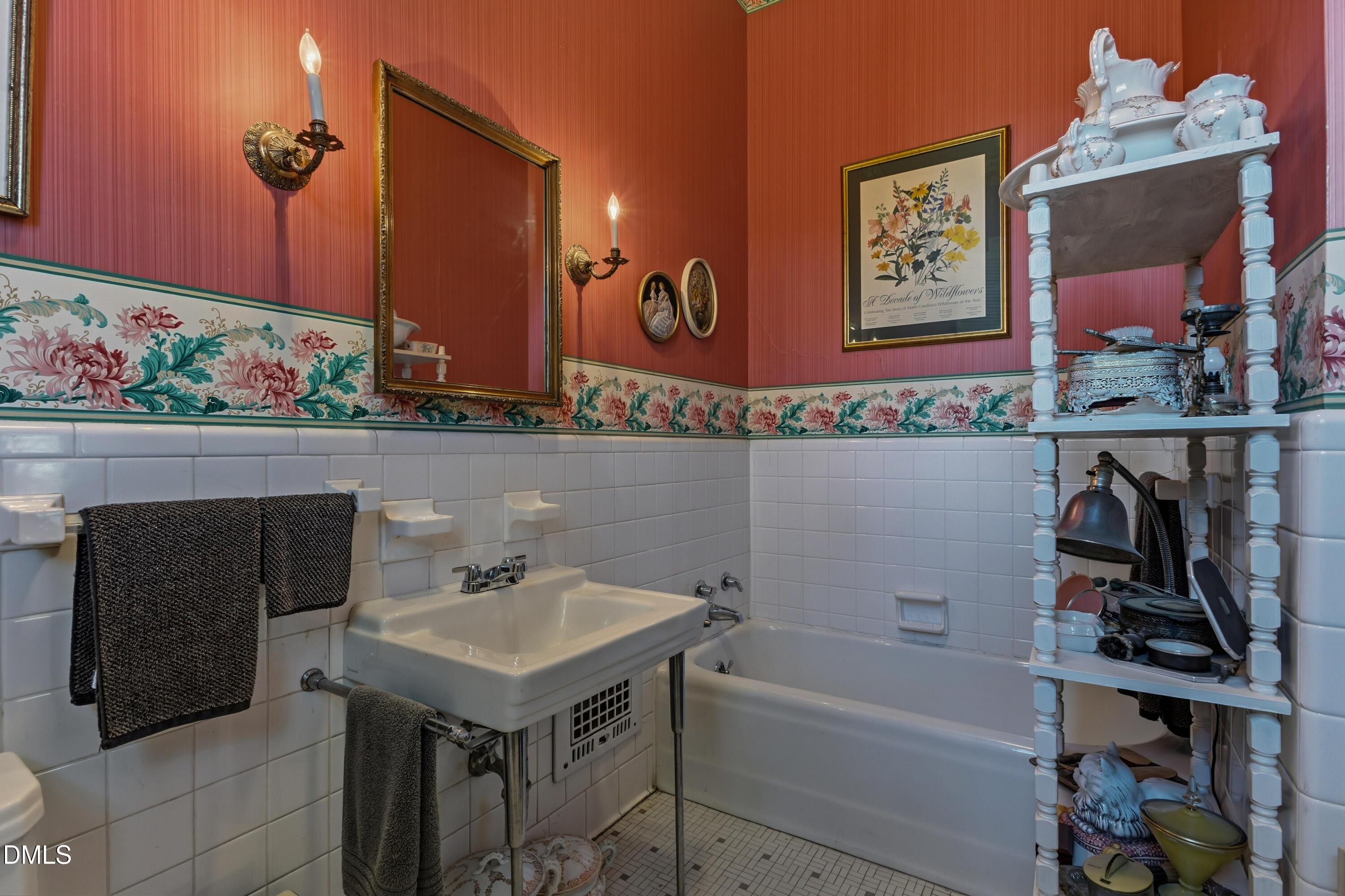 900 Nash Street North Wilson, NC 27893 - Photo 64 of 99 a bathroom with a sink and a mirror