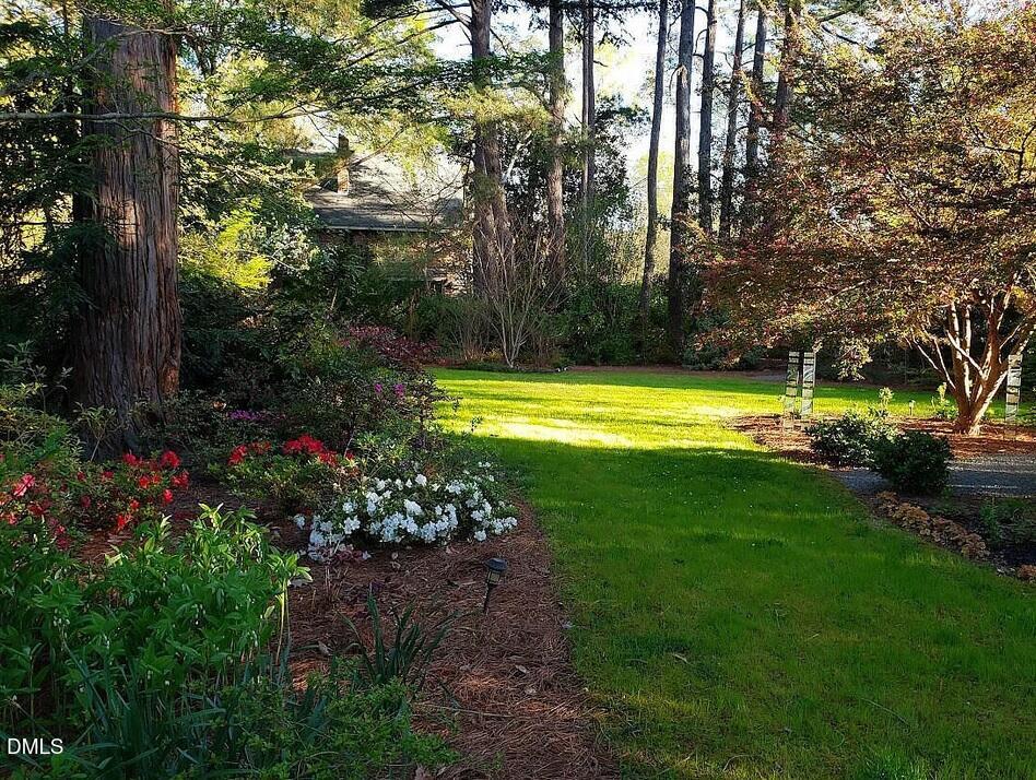 900 Nash Street North Wilson, NC 27893 - Photo 88 of 99 a view of a golf course with a garden