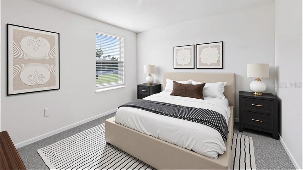 10562 Tucker Road Weeki Wachee, FL 34613 - Photo 11 of 16 a bedroom with a bed and a window