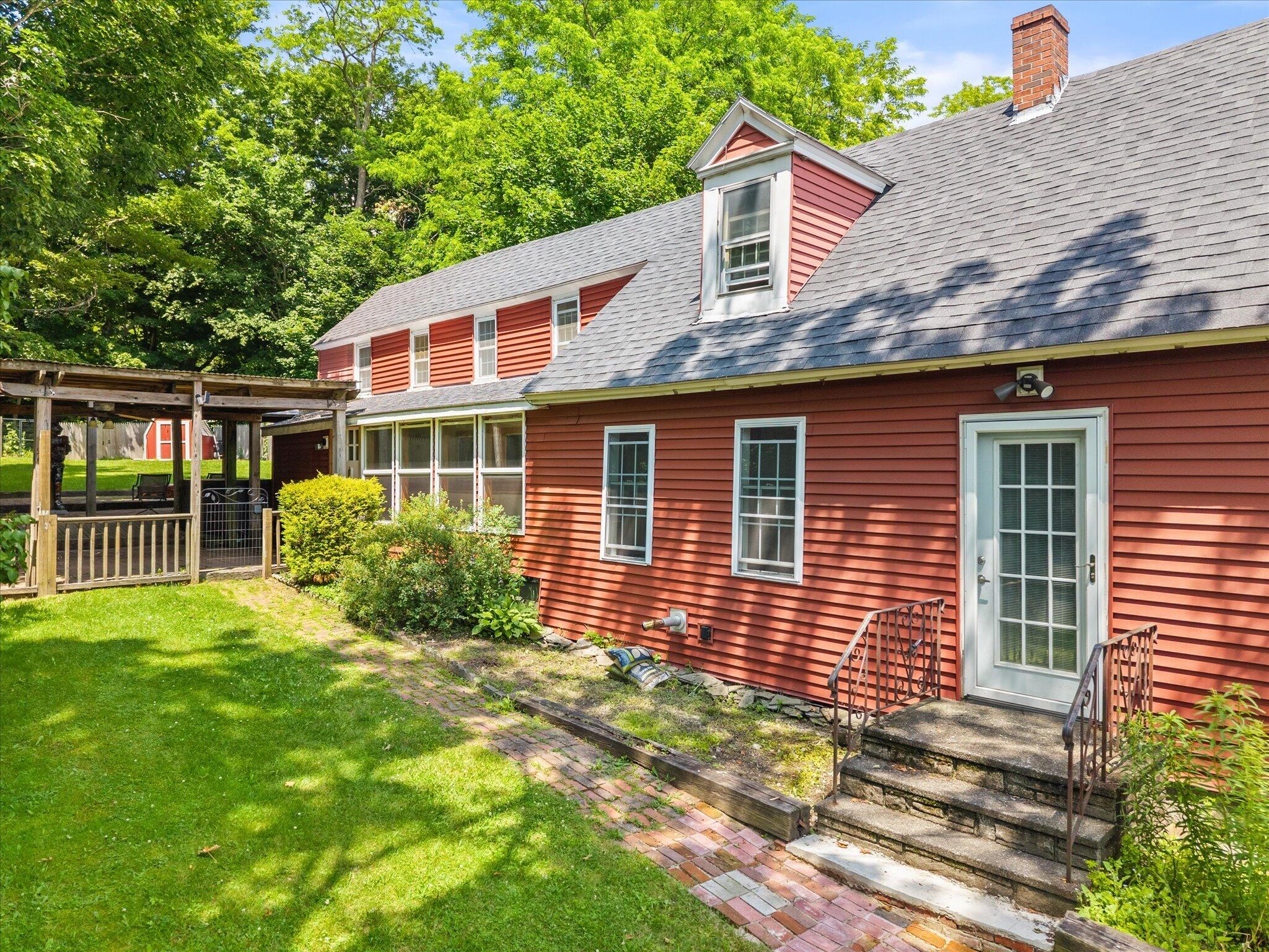137 Main Street Winterport, ME 04496 - Photo 36 of 57 Side yard/ gardens